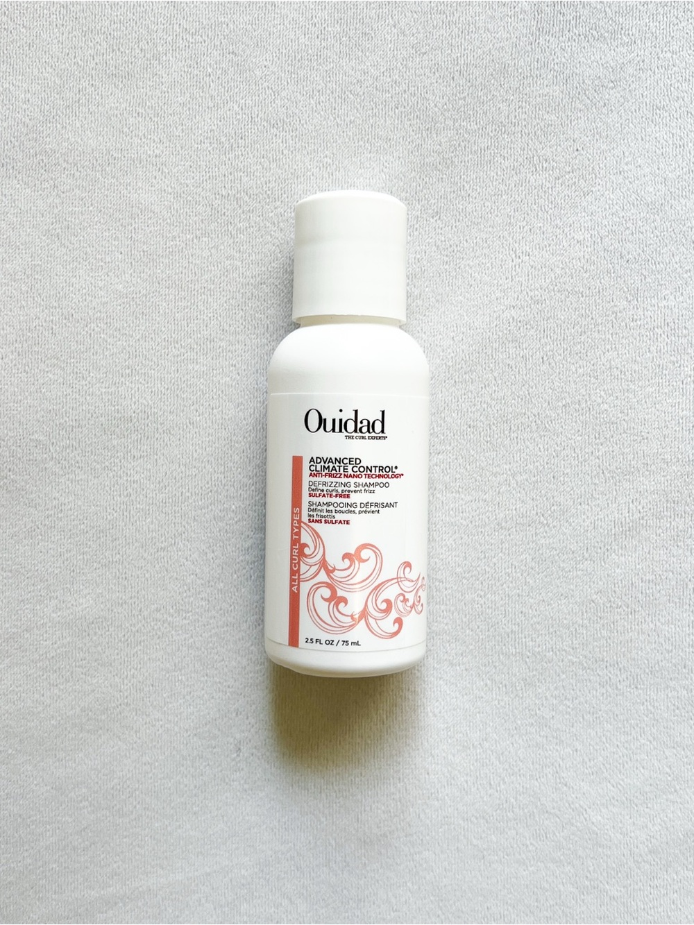 Ouidad Advanced Climate Control Defrizzing Shampoo - White with Coral Accent